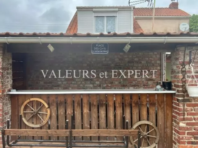 Décoration façade de la maison individuelle à vendre à Ostricourt avec jardin clos