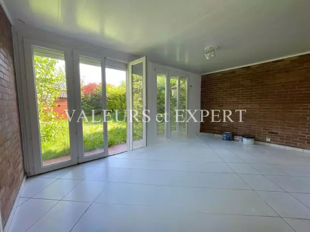 Pièce de vie ouverte sur le jardin – maison à vendre à Faches-Thumesnil