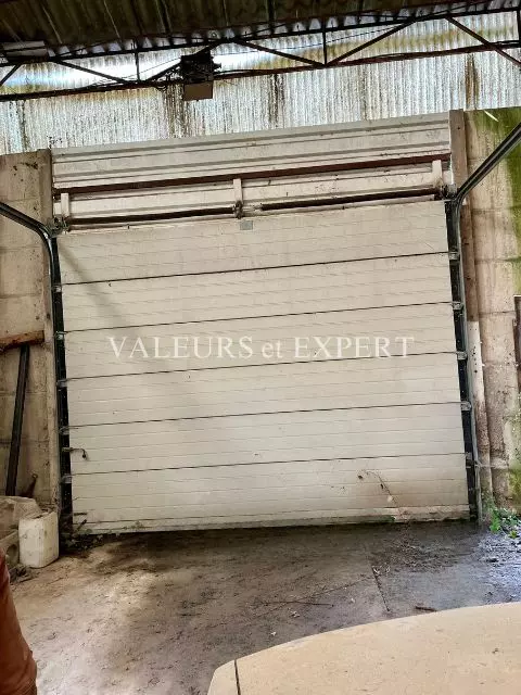 Terrain constructible avec entrepôt à Libercourt - Valeurs et Expert